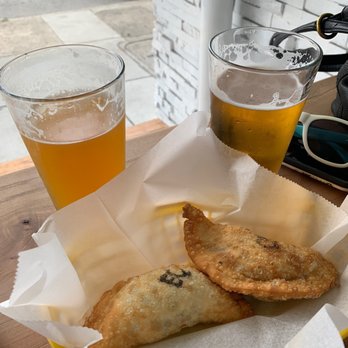 Chalos - Eapinacha & Queso empanada with the Pollo Picante empanada - Coffee & Tea Near Me - San Francisco, California