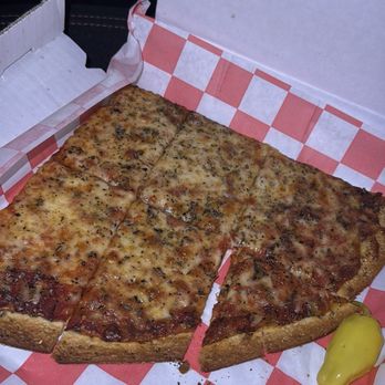 Novel Pizza Cafe - Cheese pizza slice - Pizza Near Me - Chicago, Illinois Novel Pizza Cafe - Cheese pizza slice - Pizza Near Me - Chicago, Illinois