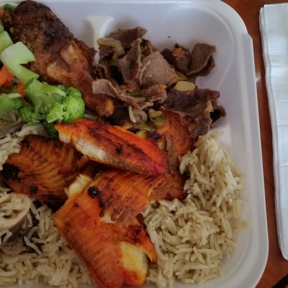 Mogadishu Restaurant - Mogadishu Somali Restaurant - Beef, Chicken & Tilapia Over Goat Rice Pilaf With Vegetables ($10) - African Near Me - Chicago, Illinois Mogadishu Restaurant - Mogadishu Somali Restaurant - Beef, Chicken & Tilapia Over Goat Rice Pilaf With Vegetables ($10) - African Near Me - Chicago, Illinois