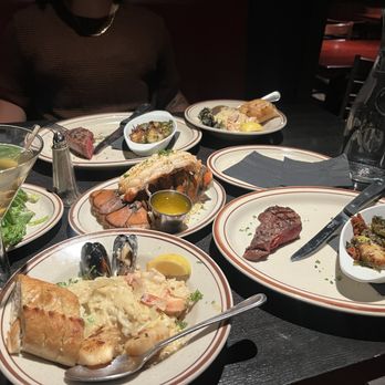 Manhattan Heights Tavern & Grill - our spread: salad, pasta, steak & lobster, drinks, and brussels sprouts - Steakhouses Near Me - El Paso, Texas Manhattan Heights Tavern & Grill - our spread: salad, pasta, steak & lobster, drinks, and brussels sprouts - Steakhouses Near Me - El Paso, Texas