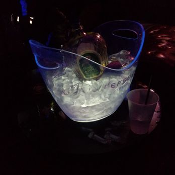 Revel Bar - a large ice bucket filled with ice and garnish - Hookah Bars Near Me - Milwaukee, Wisconsin Revel Bar - a large ice bucket filled with ice and garnish - Hookah Bars Near Me - Milwaukee, Wisconsin