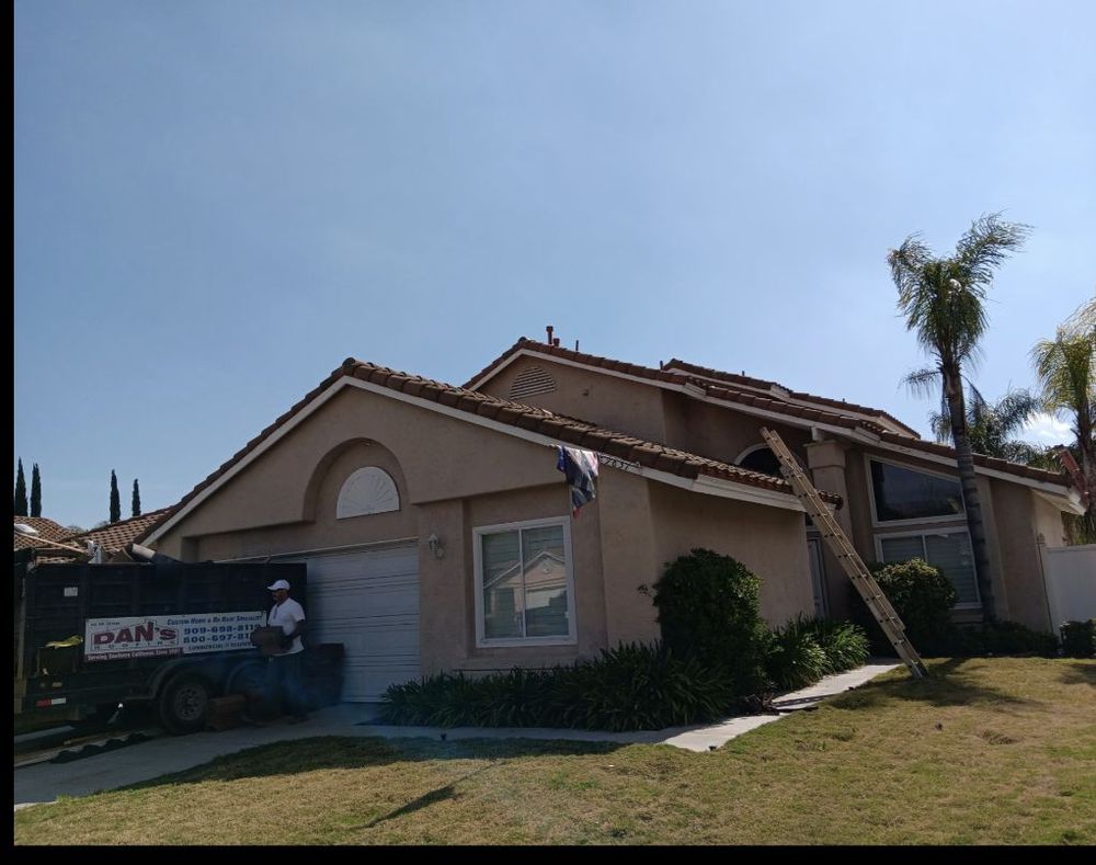 Slide of Dan's Roofing