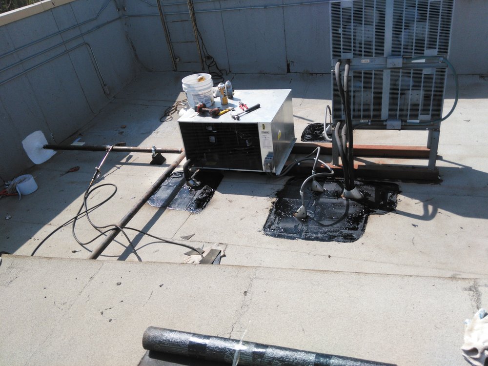 Slide of Benitez Roofing & Waterproofing