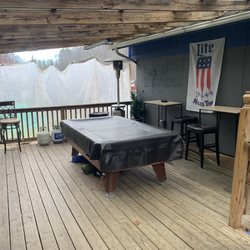 Goat Yard Grill - Outdoor deck with pool table