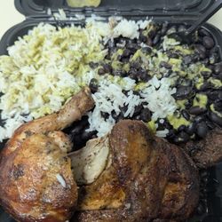 Mr. Jack Peruvian Rotisserie Chicken - 1/2 chicken with rice and beans. I poured the green sauce on for an additional kick.