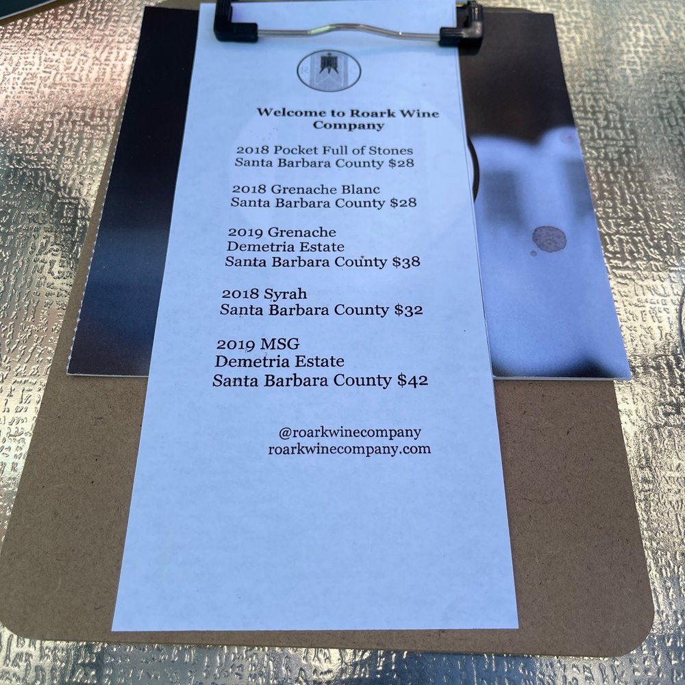 Roark Wine Company - a menu on a clipboard - Wine Tasting Room Near Me - Buellton, California