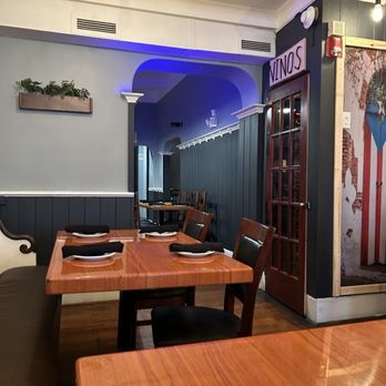 Sofrito Puerto Rican Cuisine - Dining area and wine storage - Puerto Rican Near Me - Hagerstown, Maryland Sofrito Puerto Rican Cuisine - Dining area and wine storage - Puerto Rican Near Me - Hagerstown, Maryland