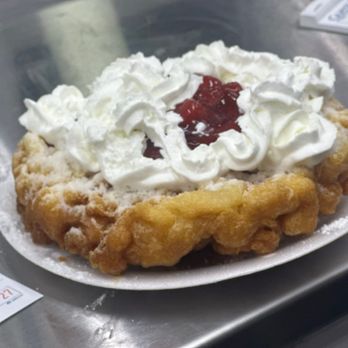 The Corner Stop 2 - Funnel cake with Cool Whip and strawberries, powdered sugar - Mexican Near Me - San Angelo, Texas The Corner Stop 2 - Funnel cake with Cool Whip and strawberries, powdered sugar - Mexican Near Me - San Angelo, Texas