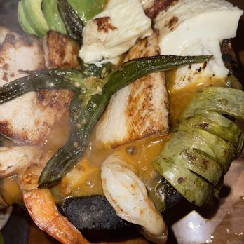 La Reyna - Authentic Mexican Cuisine - Molcajete of Shrimp and Mahi-Mahi Fish - Large enough for 2 people. - Mexican Near Me - Cooper City, Florida La Reyna - Authentic Mexican Cuisine - Molcajete of Shrimp and Mahi-Mahi Fish - Large enough for 2 people. - Mexican Near Me - Cooper City, Florida