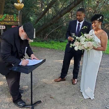Reverend Russ - Russ signing our marriage license. - Officiants Near Me - Pāhoa, Hawaii Reverend Russ - Russ signing our marriage license. - Officiants Near Me - Pāhoa, Hawaii
