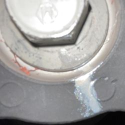 Jim Trenary Chevrolet - As you can see, this idiot marked the torque, line with white rainbow, glitter, fingernail polish WTF!!!!