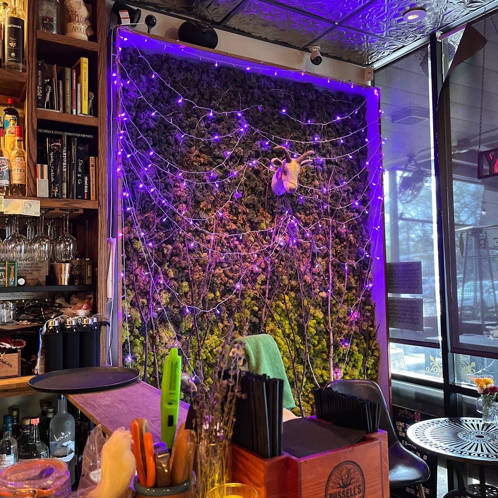 Rosewater - a view of a bar with purple lighting - Cocktail Bars Near Me - Houston, Texas Rosewater - a view of a bar with purple lighting - Cocktail Bars Near Me - Houston, Texas