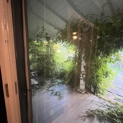 Griffin House - Front porch side view - mosquito heaven