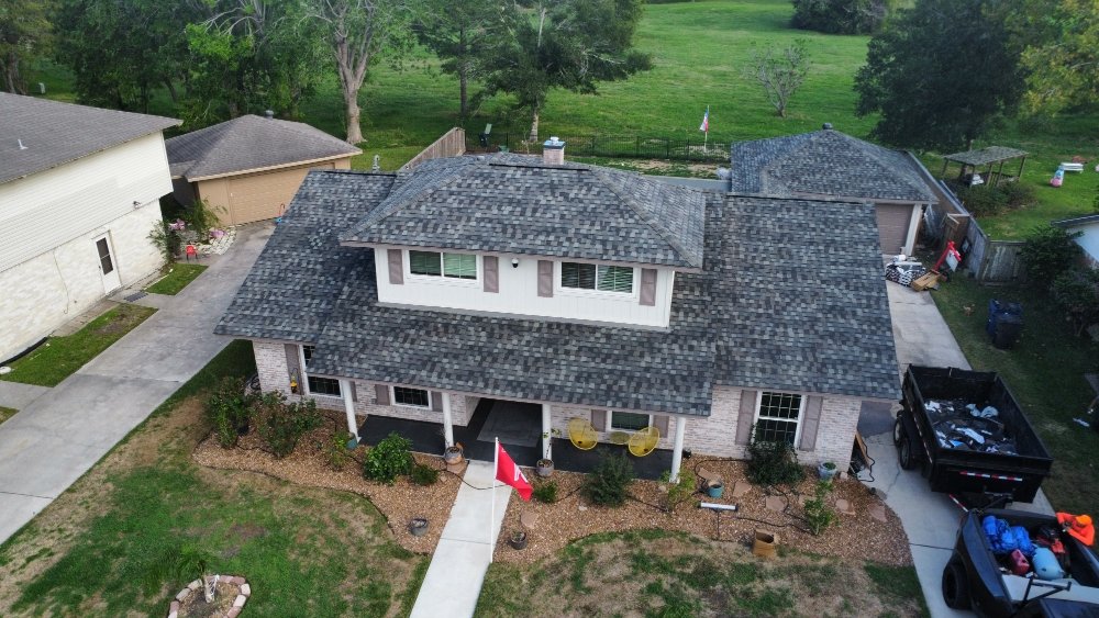 Slide of All The Way Up Roofing & Construction