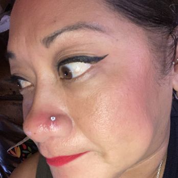 Golden Age Body Piercing - As you can see the piercing has a slit!!! After 1 1/2 months and two saline spray bottles the hoop  is not healing properly. - Piercing Near Me - Los Angeles, California
