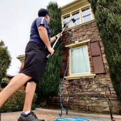 Ortiz Window Cleaning - Hard to reach windows are a breeze with my extendable water fed poll