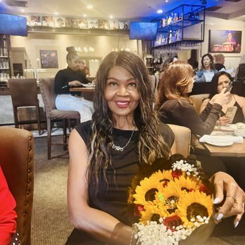 Spaghettini - Enjoying the beautiful music and my Birthday flowers- Love this! - Italian Near Me - Seal Beach, California