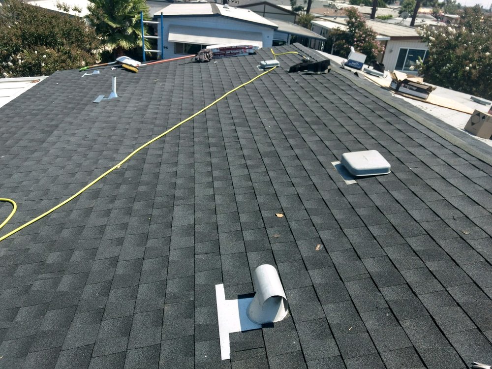 Slide of Magic Hands Roofing