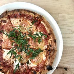 Basil & Board - Our classic margherita pizza