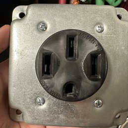 Discolored Leviton NEMA 14-50R. Discolored Leviton NEMA 14-50R.