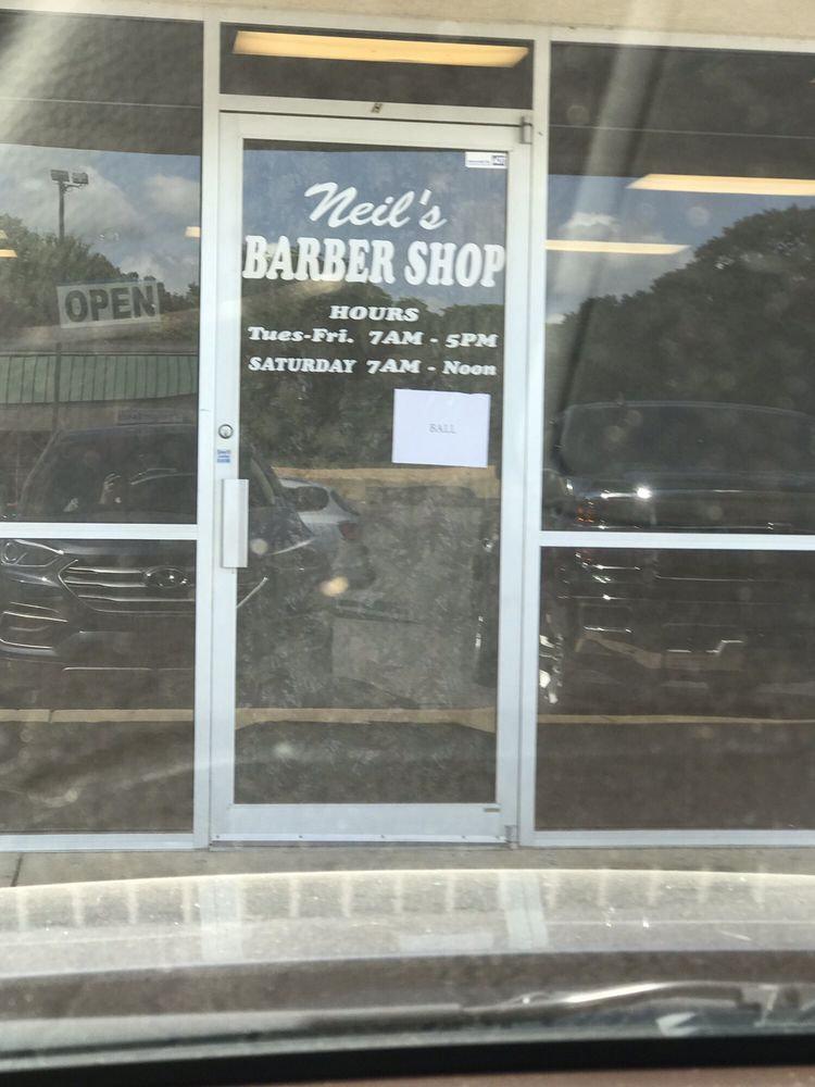 Neil's Barber Shop Logo