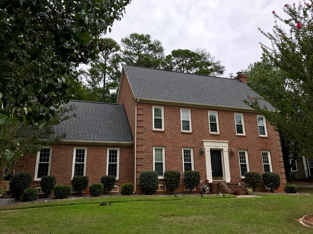 Slide of The Red Shirt Guys Roofing