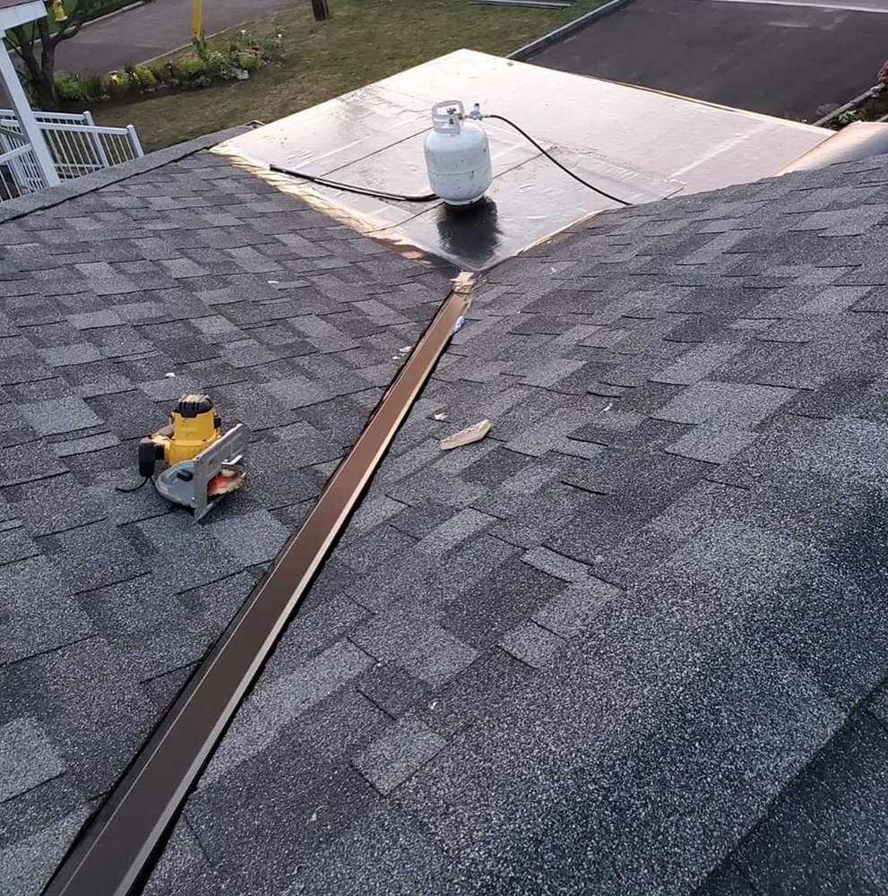 Slide of Lummus Park Roofing