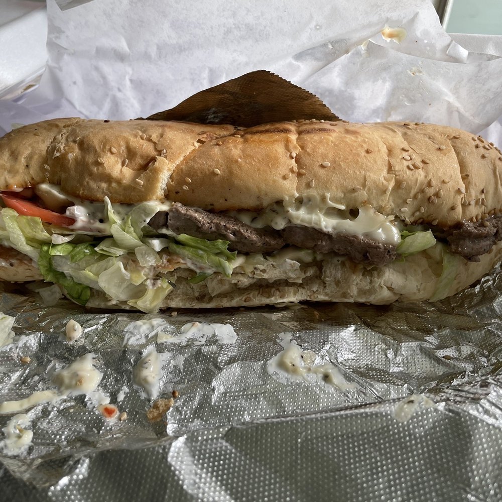 How you doin/ steak sandwich. How you doin/ steak sandwich.