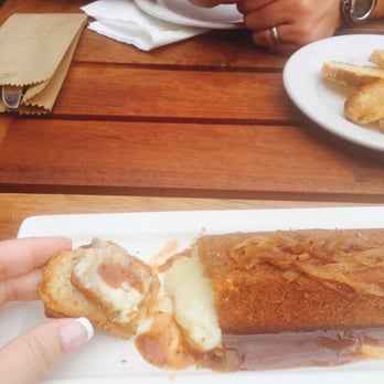 La Azotea - Amazing baked Brie with (I think) a ancho chili and honey sauce and glazed onions. - Lounges Near Me - Allende, GUA La Azotea - Amazing baked Brie with (I think) a ancho chili and honey sauce and glazed onions. - Lounges Near Me - Allende, GUA