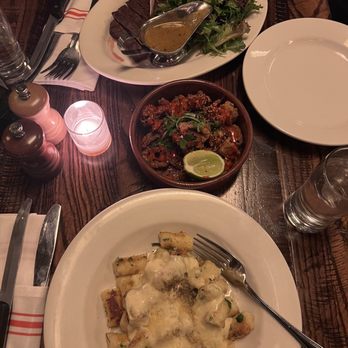 The Smith - Ricotta Gnocchi at bottom Crispy Sesame Calamari in middle, and The Smith Bar Steak at top. - New American Near Me - New York, New York The Smith - Ricotta Gnocchi at bottom Crispy Sesame Calamari in middle, and The Smith Bar Steak at top. - New American Near Me - New York, New York