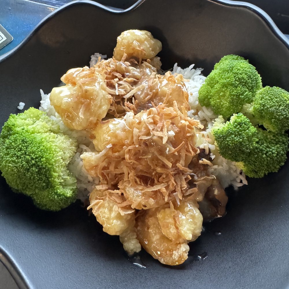 Puffy's Magic Dragon - Coconut walnut shrimp with steamed broccoli on white rice - Asian Fusion Near Me - Carolina Beach, North Carolina Puffy's Magic Dragon - Coconut walnut shrimp with steamed broccoli on white rice - Asian Fusion Near Me - Carolina Beach, North Carolina