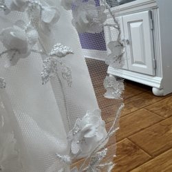 Coastal Cleaners - You can see how the lace looks like it was cut with bad scissors