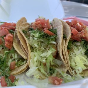 Photo of Cotija's Taco Shop - San Diego, CA, United States. 3 shrimp tacos with only lettuce, tomatoes and cilantro per my request. The owner was very sweet!