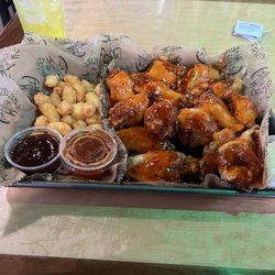 Wings Etc. - Cha Cha traditional chicken wings and cheese curds. Awesome!! A+