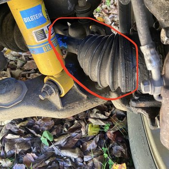 Professional Brake & Tire - Another image of the "NEW" CV Axle that I was charged for. For comparison the yellow strut was replaced by me months earlier. - Auto Repair Near Me - Sylva, North Carolina Professional Brake & Tire - Another image of the "NEW" CV Axle that I was charged for. For comparison the yellow strut was replaced by me months earlier. - Auto Repair Near Me - Sylva, North Carolina