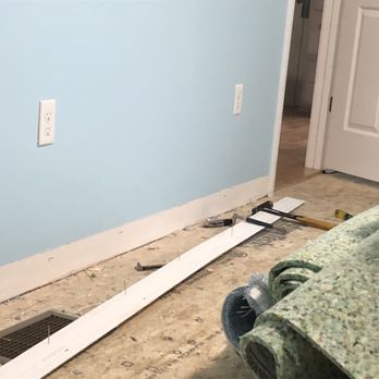 Get Well Home Improvements - a room being remodeled - Painters Near Me