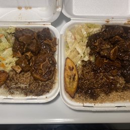 Caribbean Delight and Jamaican Grill Ox tail platters before digging.