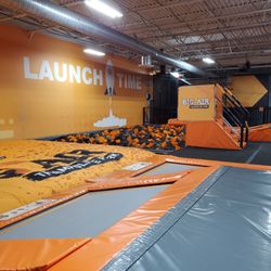 Big Air Hiram - Big foam pit I'm background. Note "diving board" style jump. Jump pad in foreground.