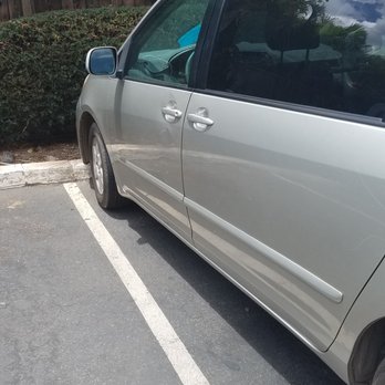 Manaloha Rent A Car - Good sized dent in the door! - Car Rental Near Me - Wailuku, Hawaii