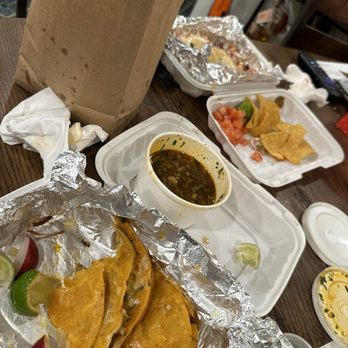 Taco Loco - Birria and chicken tacos in the middle of devouring them. - Tacos Near Me - East Rutherford, New Jersey Taco Loco - Birria and chicken tacos in the middle of devouring them. - Tacos Near Me - East Rutherford, New Jersey