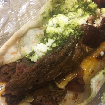 Torchy's Tacos - Vagabond (Taco of the Month) ...grilled steak on top bacon...sauce and cheese was deeelicious - Tacos Near Me - Austin, Texas Torchy's Tacos - Vagabond (Taco of the Month) ...grilled steak on top bacon...sauce and cheese was deeelicious - Tacos Near Me - Austin, Texas
