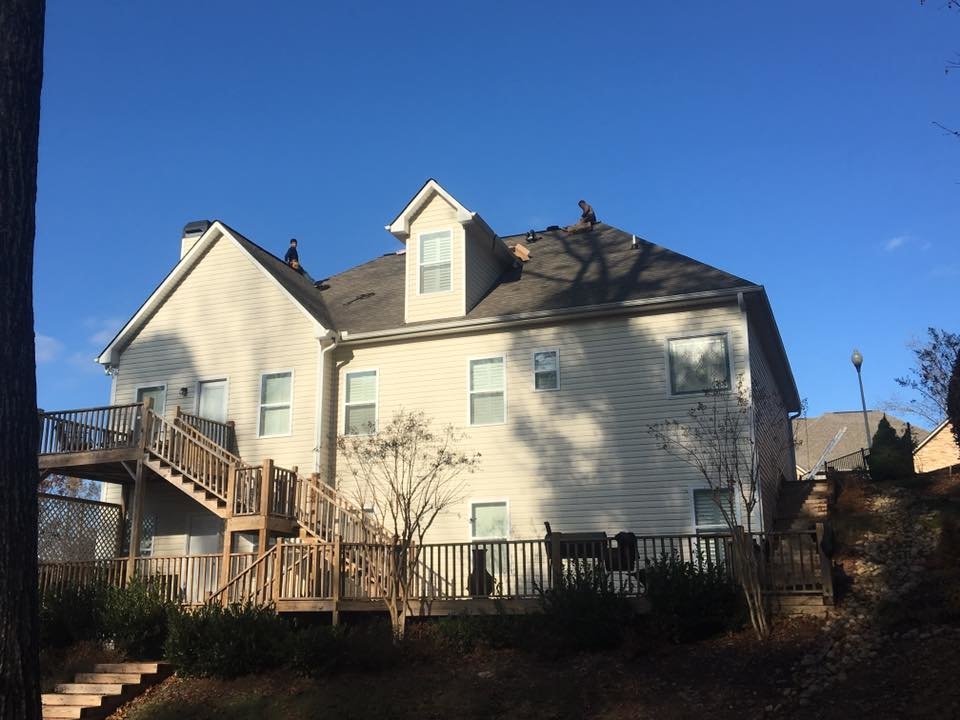 Slide of Rainblocker Roofing & Construction