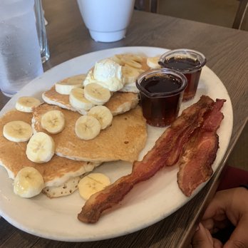 Rosine's Restaurant - Banana pancakes with a side of bacon. - American Near Me - Monterey, California Rosine's Restaurant - Banana pancakes with a side of bacon. - American Near Me - Monterey, California