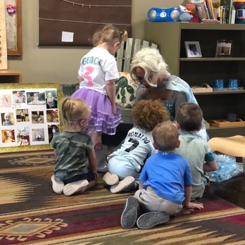 Fair Maidens and Masks - She had their full attention for story time. - Party Characters Near Me