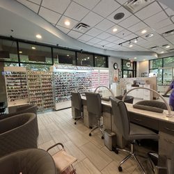 MC Spa & Nail Bar - Manicure stations and color wall