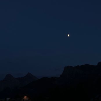 Patrinos Steak House & Pub - Moonrise outside - Pizza Near Me - Canmore, Alberta