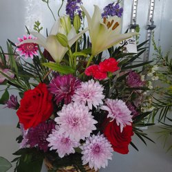 Laws Feed Store - Flowers in the cooler or made to order. We deliver.