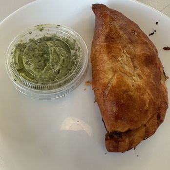 Bushfire Kitchen - Beef empanada with pesto/garlic spread. Tasty. - American Near Me - Brea, California Bushfire Kitchen - Beef empanada with pesto/garlic spread. Tasty. - American Near Me - Brea, California