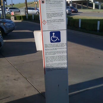 Davo's Shell - a handicapped parking sign - Beer, Wine & Spirits Near Me - Grapevine, Texas