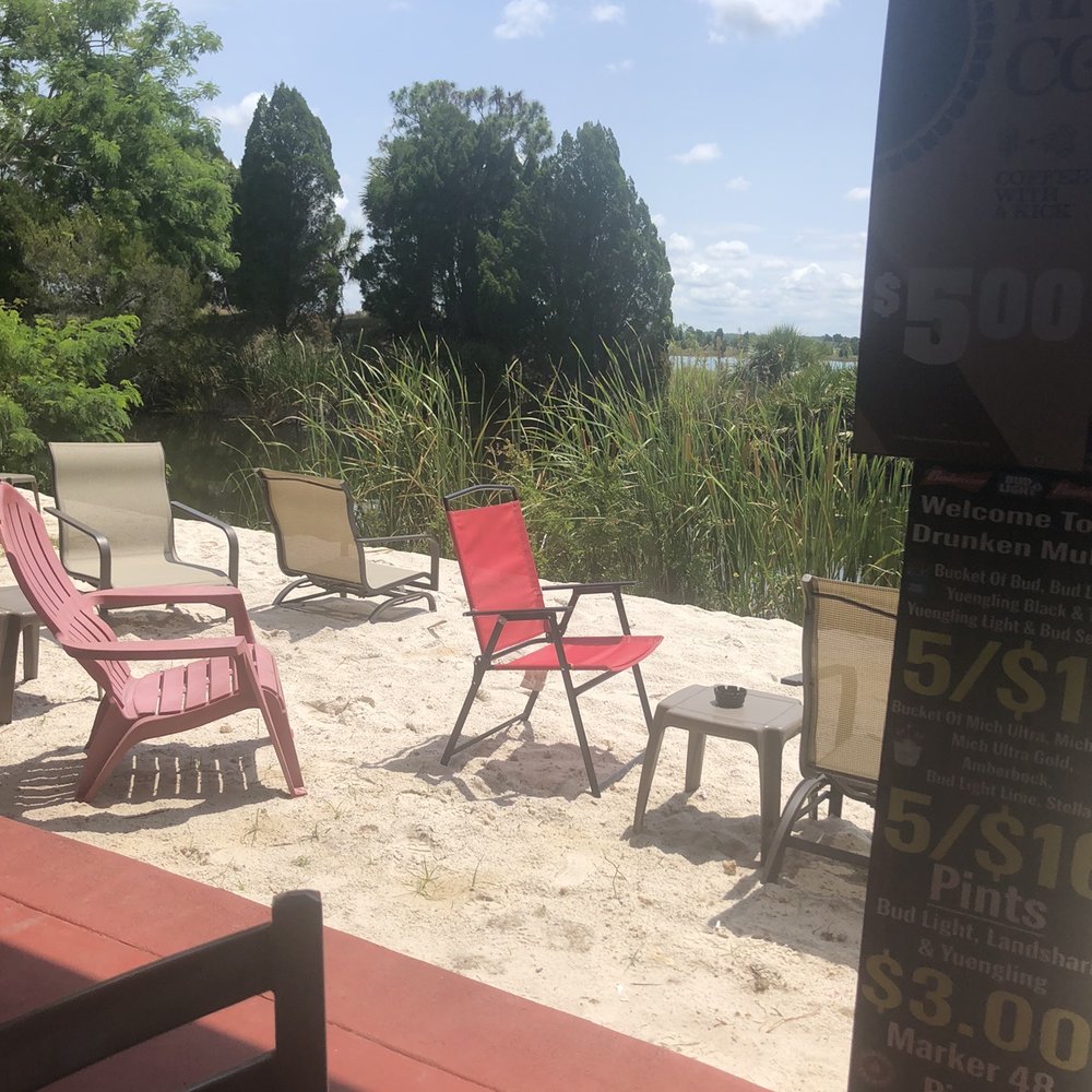 Drunken Mullet - Back patio bar area. - Sports Bars Near Me - Hernando Beach, Florida Drunken Mullet - Back patio bar area. - Sports Bars Near Me - Hernando Beach, Florida